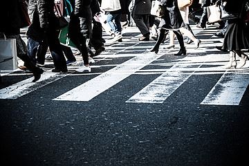 pedestrians crossing a crosswalk